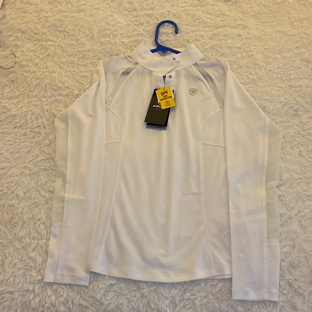 Brand Ariat shirt with plenty of ventilation. Can be used for showing.